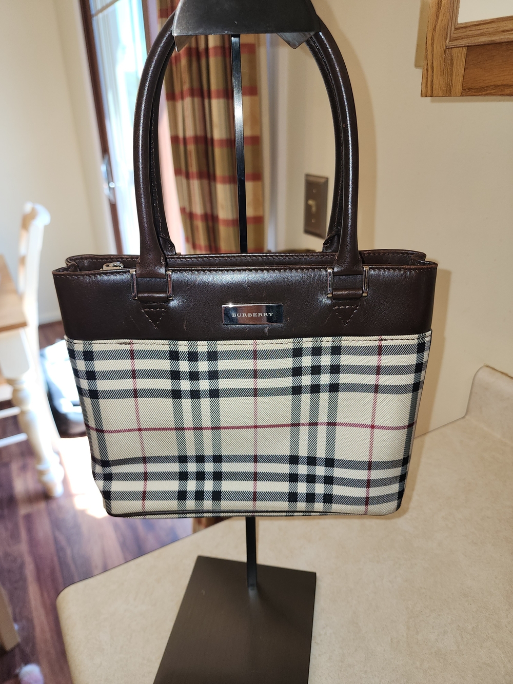 Burberry House Check canvas top handle bag featuring brown leather trim